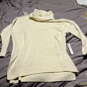 High low turtleneck sweater never worn